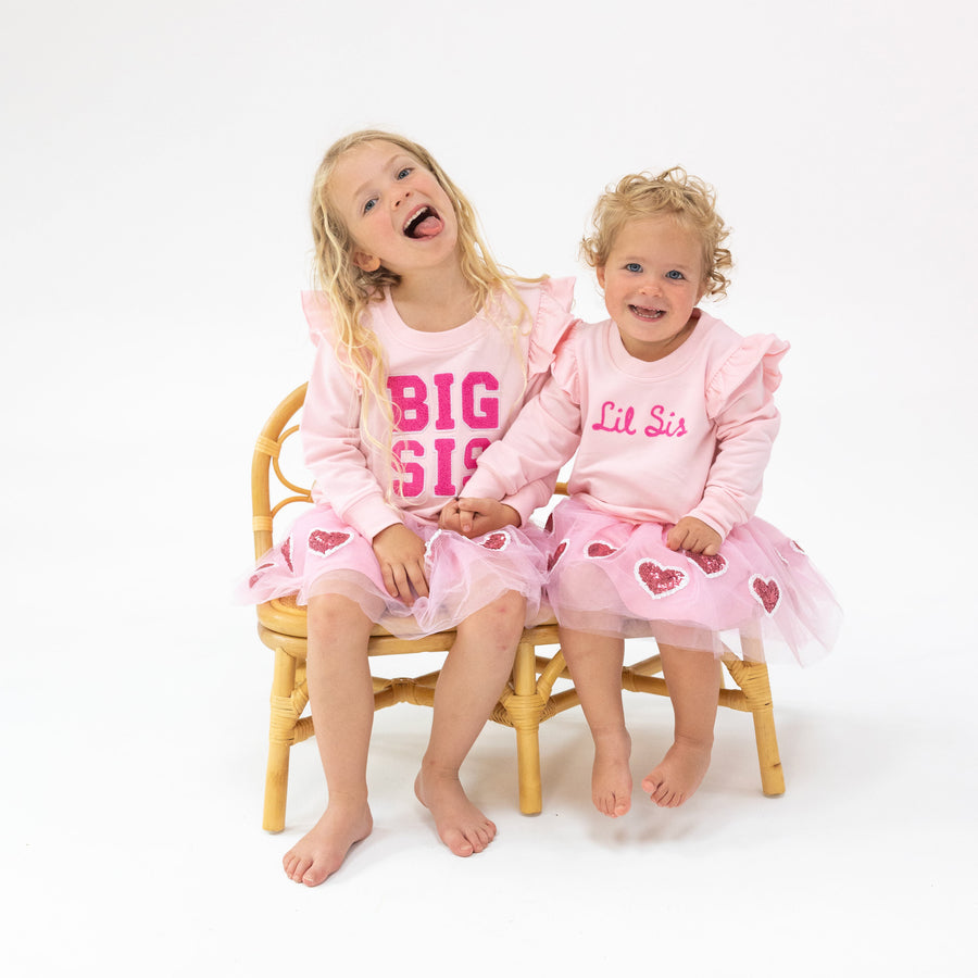 BIG SIS RUFFLE SWEATSHIRT