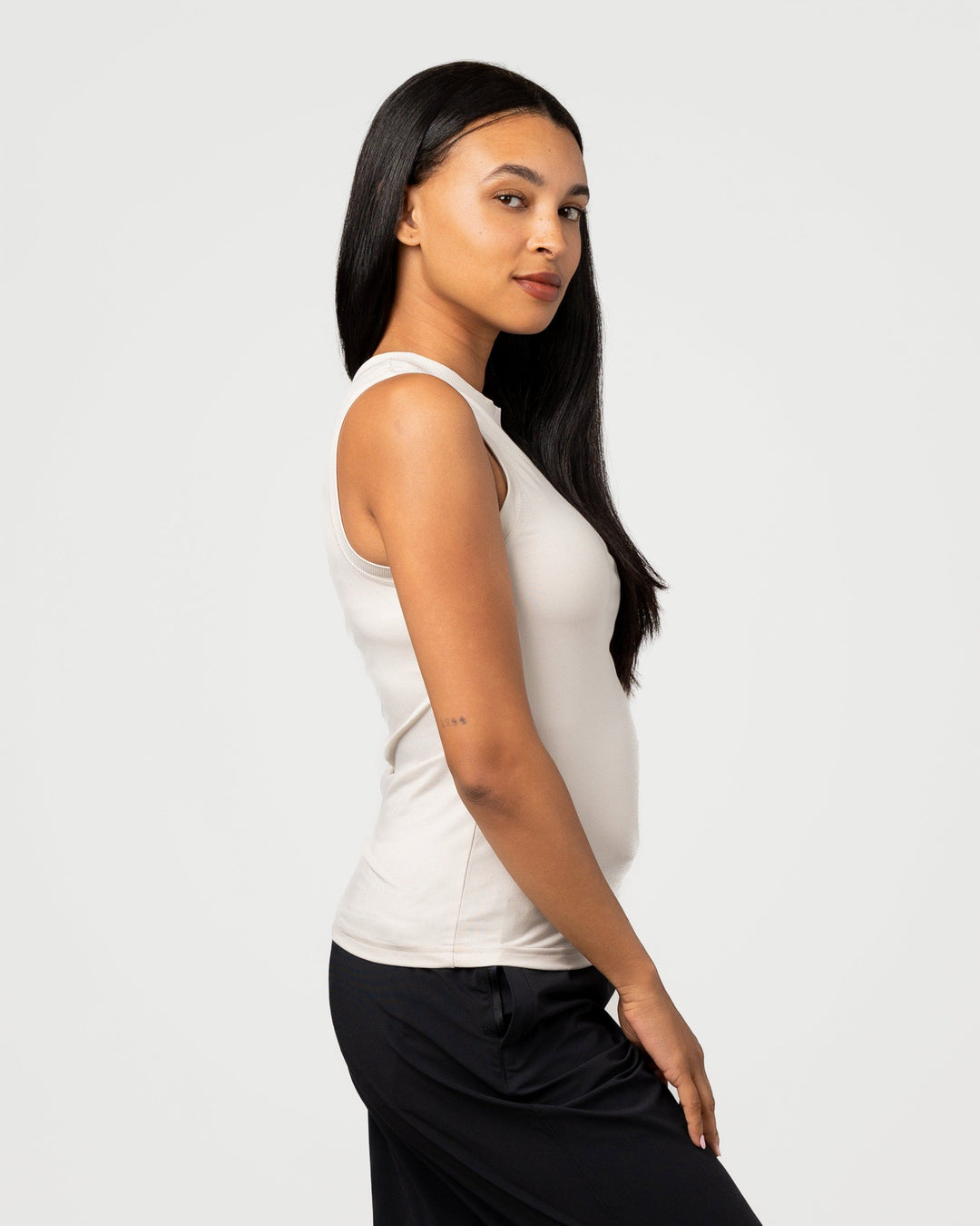 SAND VARSITY HIGH STRETCH FITTED TANK