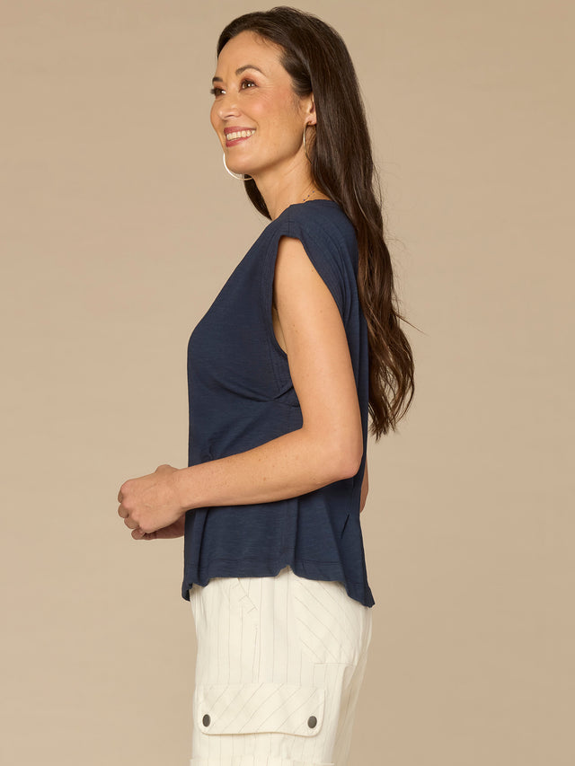NAVY EMBROIDERED PLEATED PEPLUM TOP
