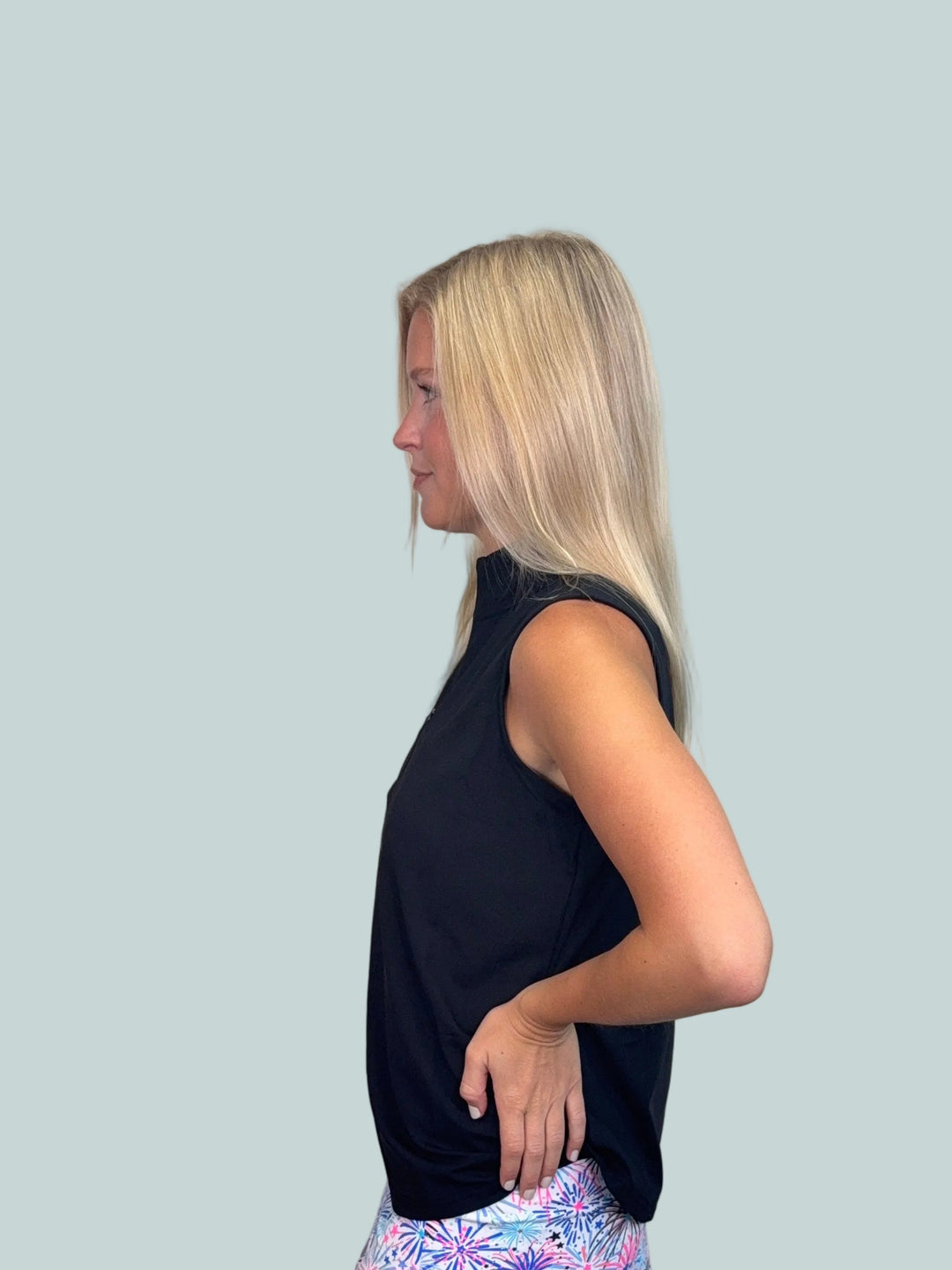NELLIE BLACK SLEEVELESS ZIP TOP