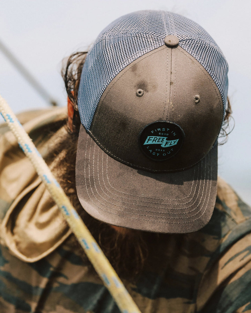 FIRST AND LAST CHARCOAL TRUCKER HAT
