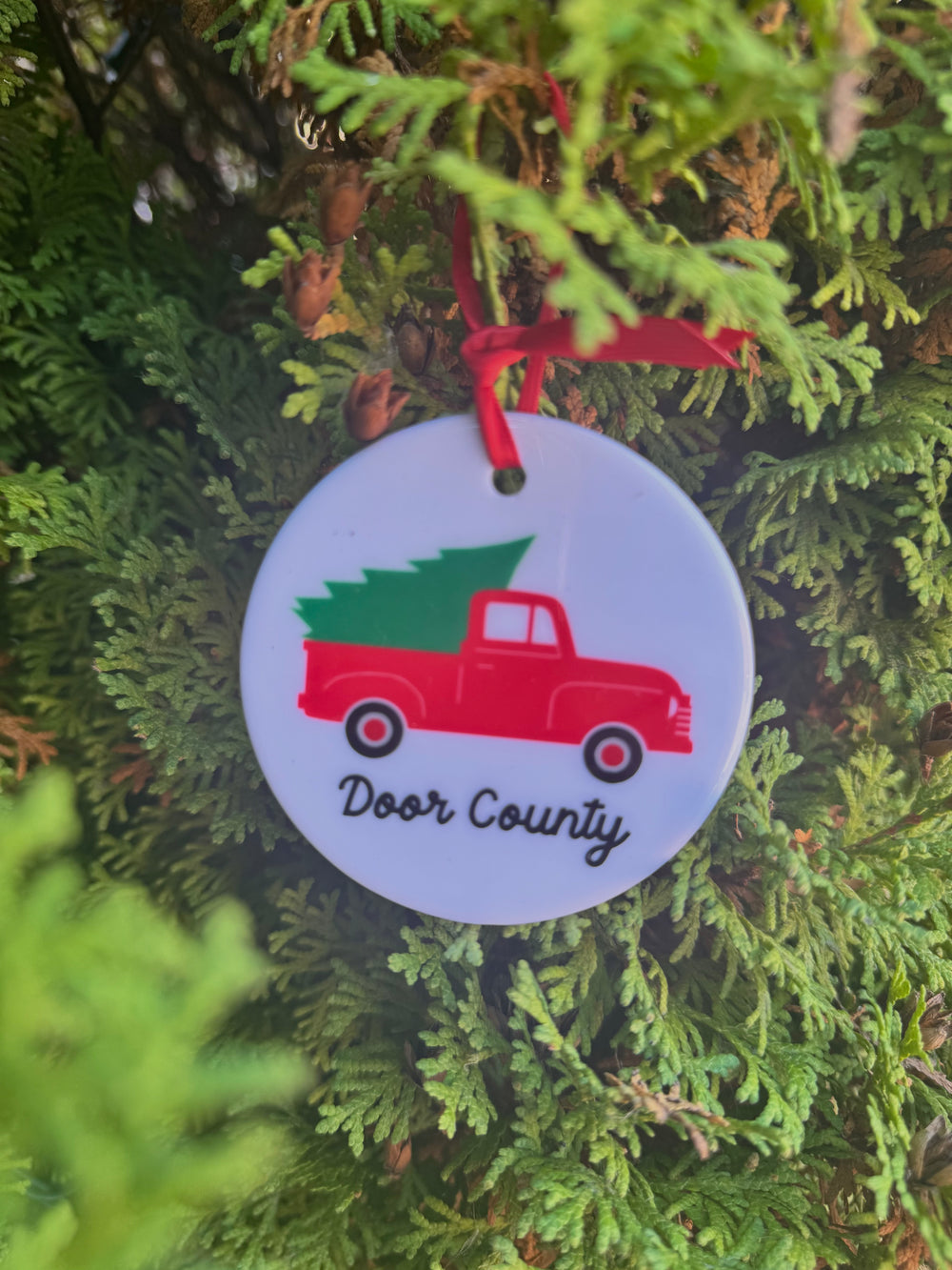 DOOR COUNTY CHRISTMAS TREE TRUCK CERMAIC ORNAMENT
