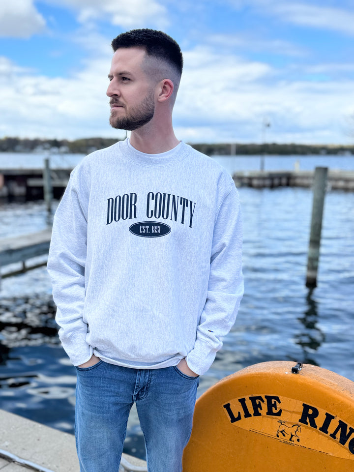 CHAMPION DOOR COUNTY REVERSE WEAVE CREW SWEATSHIRT