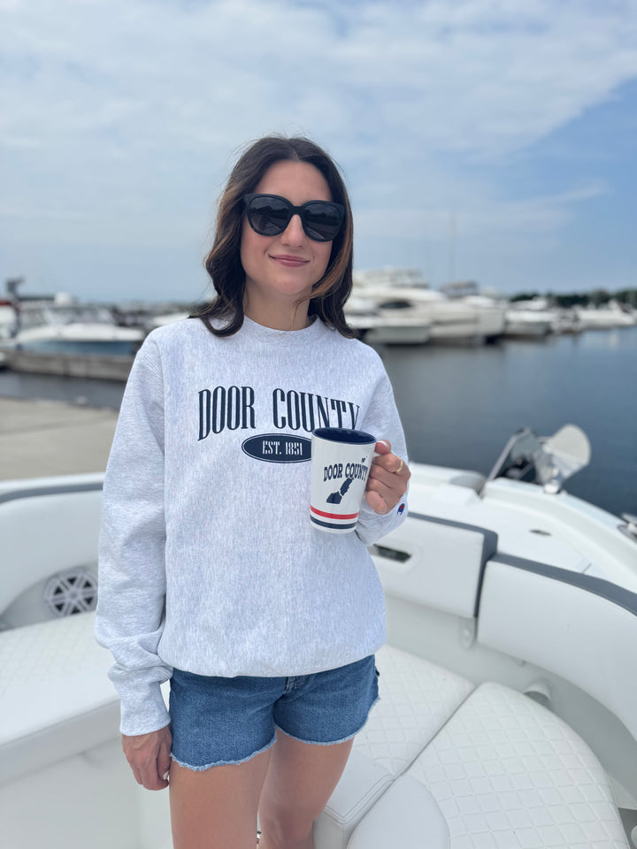 CHAMPION DOOR COUNTY REVERSE WEAVE CREW SWEATSHIRT