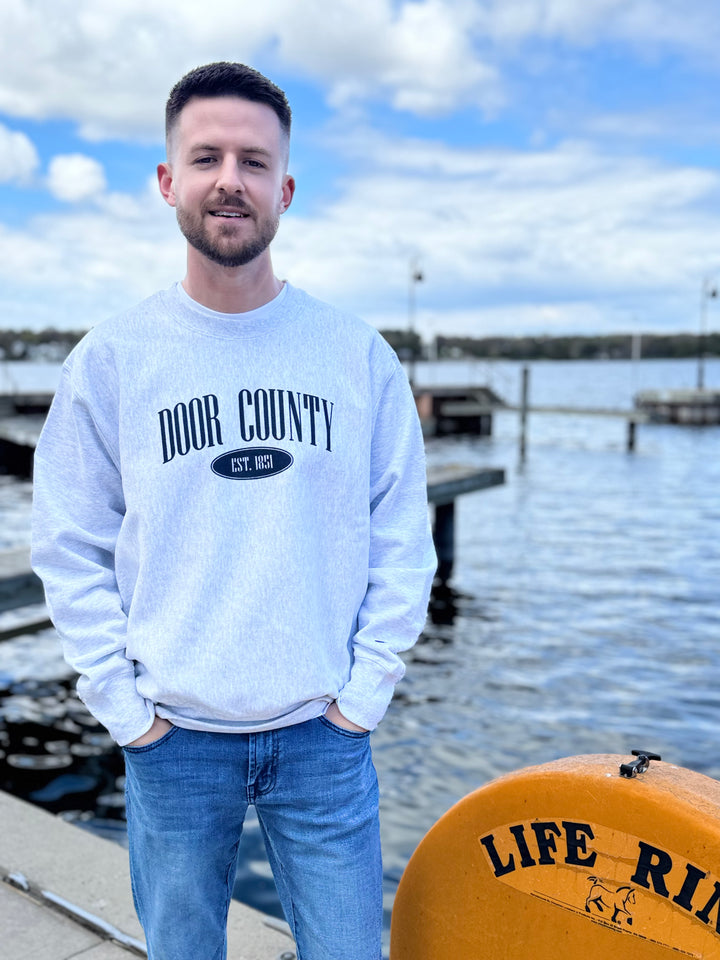 CHAMPION DOOR COUNTY REVERSE WEAVE CREW SWEATSHIRT