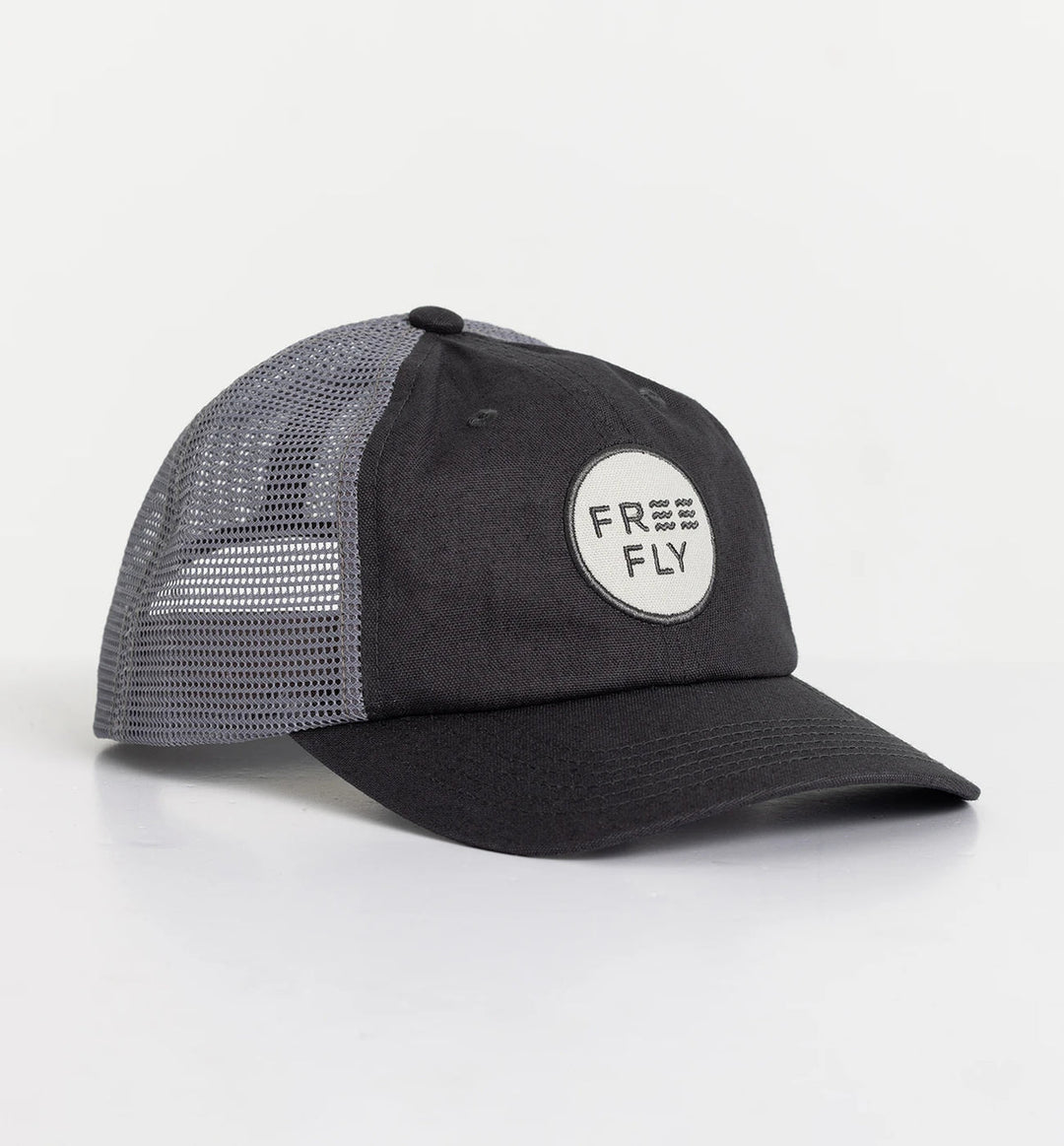 WASHED NAVY LOW PRO BADGE TRUCKER HAT