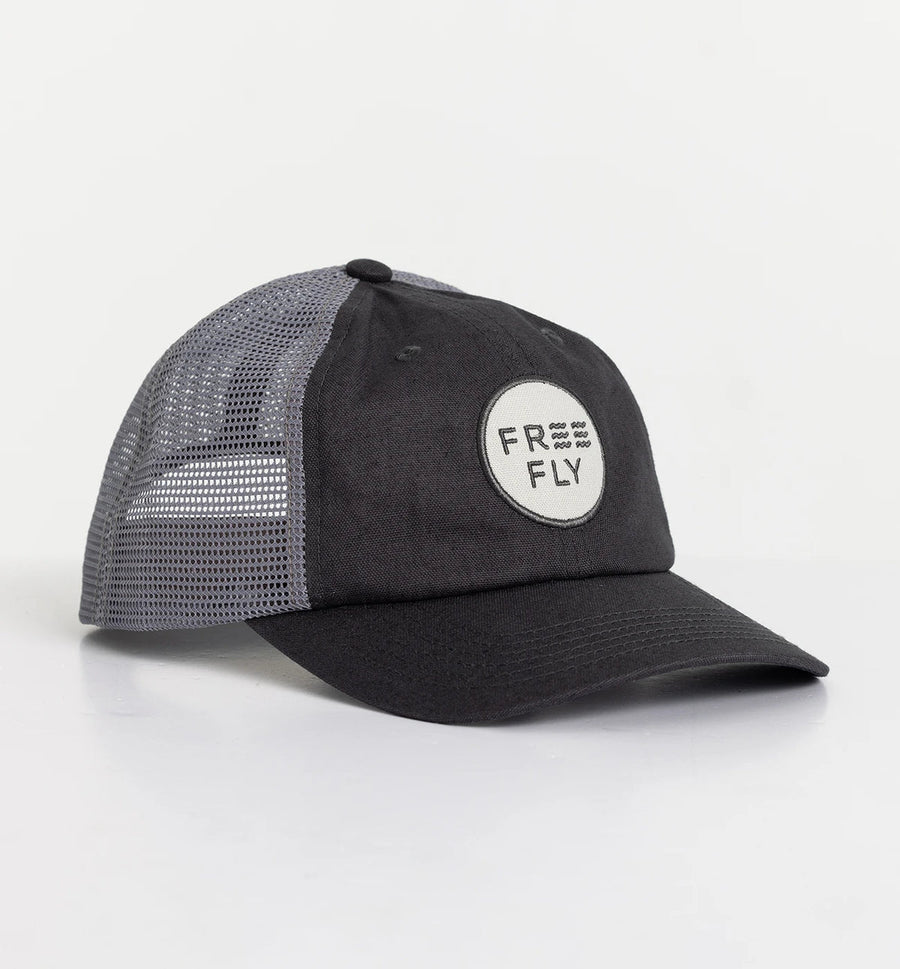 WASHED NAVY LOW PRO BADGE TRUCKER HAT
