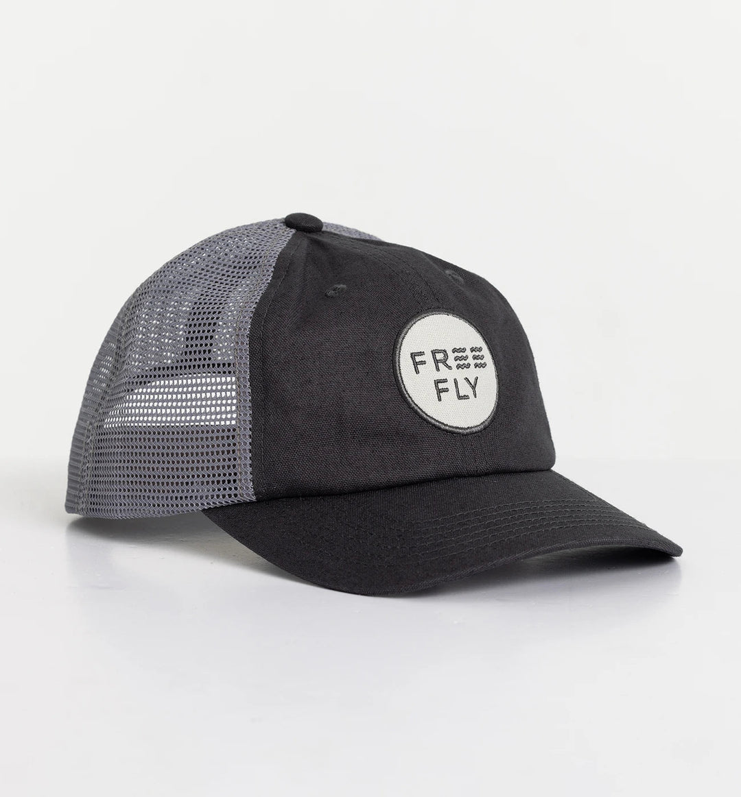 LOW PRO WASHED NAVY BADGE TRUCKER HAT