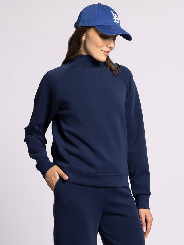 DEEP BLUE KAI MOCKNECK KNIT TOP
